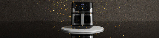 Air fryer on a pedestal with confetti